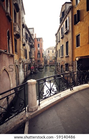 small bridge and architectural fragments from buildings in Venice - Italy