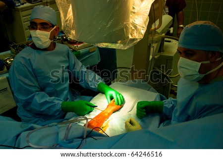 Doctors in Operation Theater doing hand surgery