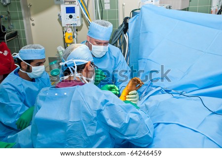 Doctors in Operation Theater doing hand surgery