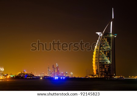 DUBAI - JANUARY 4: Burj al Arab hotel, one of the few 7 stars hotel in the world and one of the most recognized luxury symbol at night on JANUARY 4, 2012 in Dubai, United Arab Emirates
