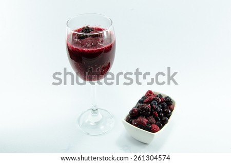 Berry smoothie and Berry sauce in cup