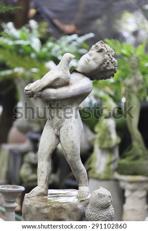 Cupid Statue sculpture in the garden.