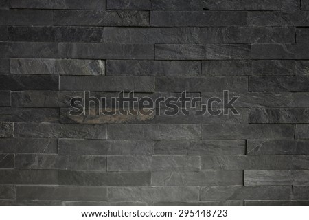 Back Stone wall background texture with Lighting from below side.