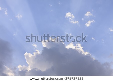 Clouds and Blue Sky with Ray of Light Background texture.