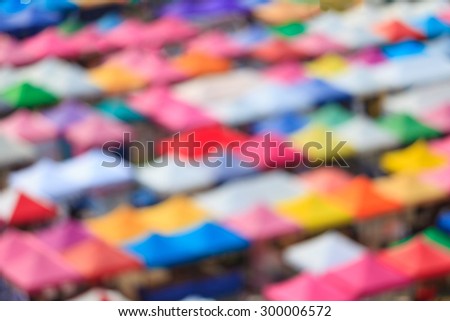 Blurred Background of  Colorful Tents in the market.