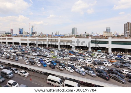 BANGKOK, THAILAND - July 24, 2015: parking lot and skyline next to Chatuchak Market on July 24, 2015 in Bangkok. Chatuchak weekend market is the largest in Thailand with 200,000 visitors per day.