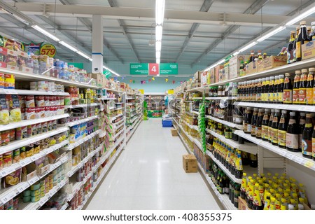 Trat, Thailand - April 14, 2016: Aisle view of a Tesco Lotus supermarket. Tesco Lotus supermarket on August 22, 2015. Tesco is the world\'s second largest retailer with 6,531 stores worldwide.