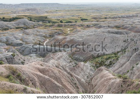 The rolling eroded rock and soil formations at Badlands National Park, South Dakota.