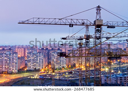 Cranes and housing estate