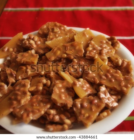 Peanut brittle candy on a plate