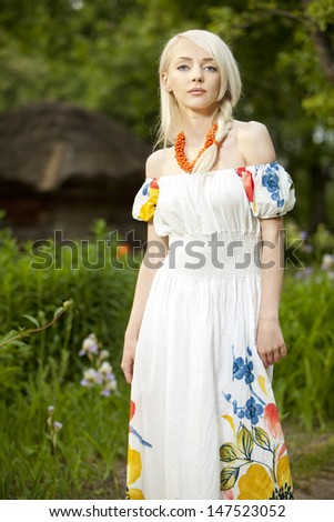 21 Mpix full-frame HD-capture. Professionally retouched. young rural woman at the garden
