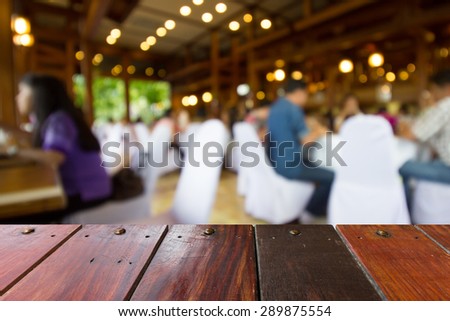 Look out from the table,blur of dining room at hotel use for background.