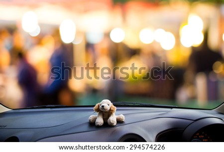 Look out the car window , people walking and shopping at street markets,use for background