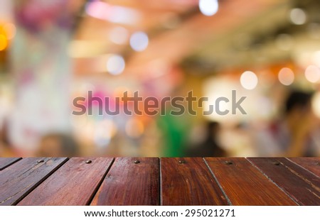 Blurred blue and pink  food court in the mall background scene or use for product presentation related images.