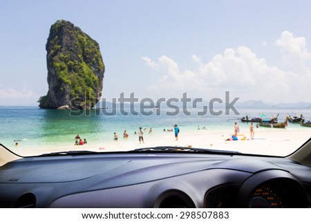 Look out the car window , Blur people play on the beach,use for background.