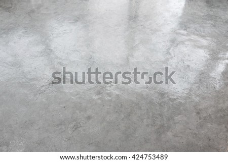 Wax cement. Wax cement texture. Wax cement background. Wax concrete texture. Wax cement floor. Cement material. Floor material. Reflection on floor. Slip floor. Interior floor. Gray texture. Grunge