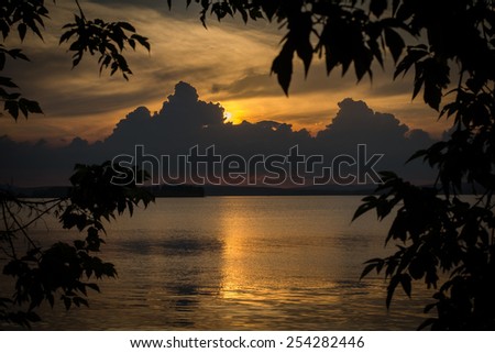 cloudy sunset on lake