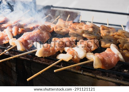 Grilled pork  in Thai language is \