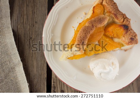 Piece of peach shortcake and meringue selective focus horizontal filtered