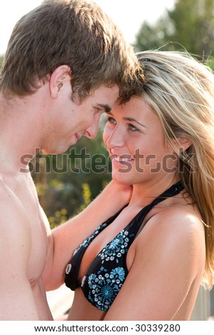 A young couple in love look into