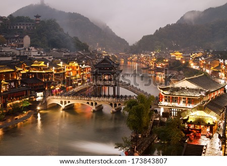 Fenghuang (Phoenix) ancient town at night, Hunan province, China.