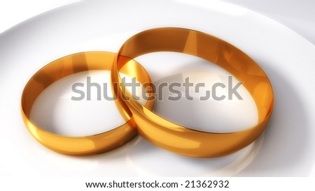 stock photo Wedding gold rings on the light background being nearby