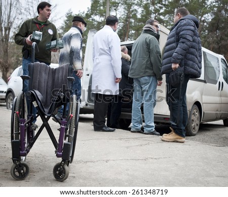 March 14, 2015. Sievierodonetsk, ATO zone, Ukraine. Volunteers pass on humanitarian aid to the hospital.