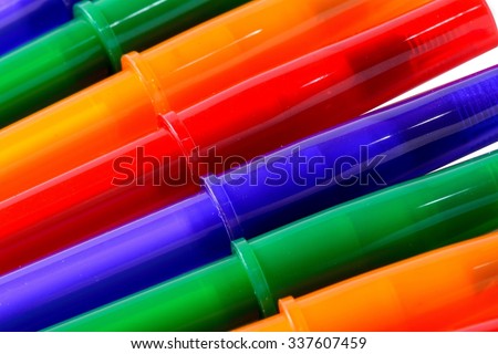 Close-Up of Colorful Ballpoint Pens with Pen Cap - Isolated
