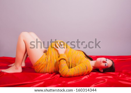 healthy pregnant woman doing gymnastic at home