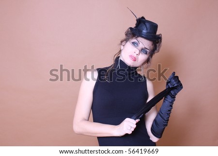Elegant woman with black satin gloves