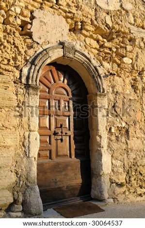 Ancient door of an old village in France (Provence).