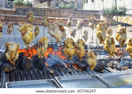 chicken cooked over a wood fire