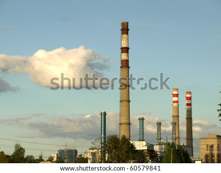 Huge industrial chimneys stopped producing smoke for a moment - environment protection concept