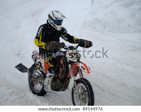 RIGA, LATVIA - JANUARY 7: Unidentified motocross rider at Winter motocross championship, Jan 7, 2011 at \