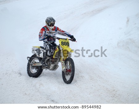 RIGA, LATVIA - JANUARY 7: Unidentified motocross rider at Winter motocross championship, Jan 7, 2011 at 