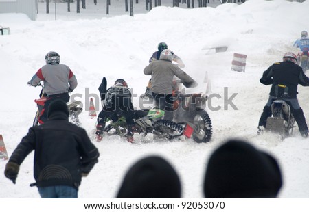 RIGA, LATVIA - JANUARY 7: Crash at the beginning of race at Winter motocross championship on Jan 7, 2011 at \
