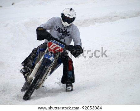 RIGA, LATVIA - JANUARY 7:Unidentified amateur motocross rider at Winter motocross championship on Jan 7, 2011 at \