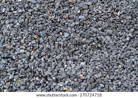 Pile of dusted stones background texture.