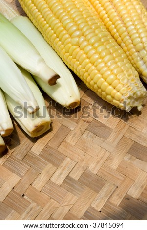 Variety of corn on bamboo tray