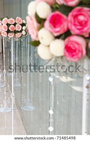 Beautiful rose flowers bucket arrangement at wedding