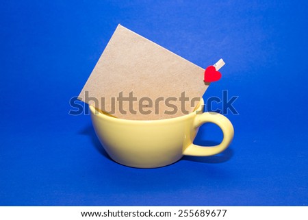 Mailing Envelope  in the yellow cup on a blue background.