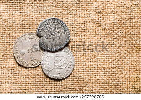 A lot of old silver coins  on the old cloth