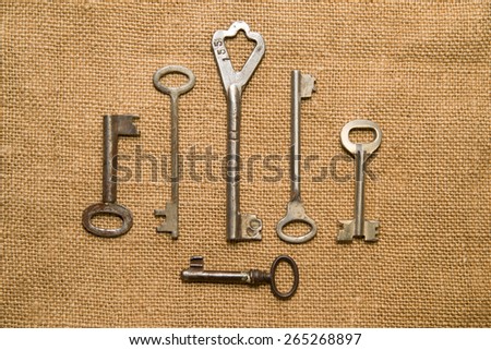 Six vintage keys to the safe on  old cloth