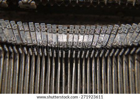 Metal parts for printing documents on an old typewriter
