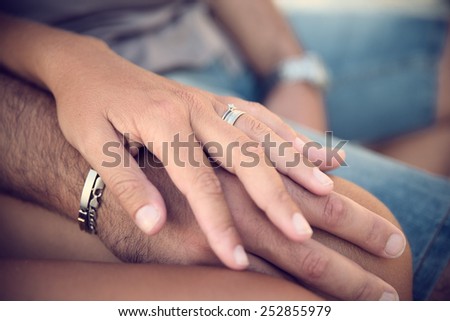 Close-up of clasped hands boyfriends