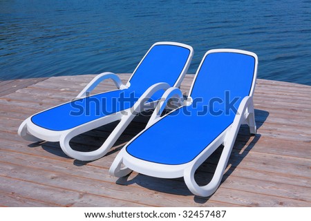 Two deck chairs on the deck pier