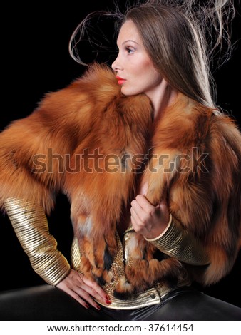 woman in a fox fur coat