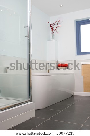 A contemporary designer bathroom in a new property development