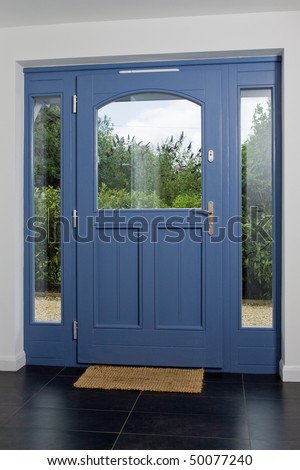 Front door of a newly built modern property