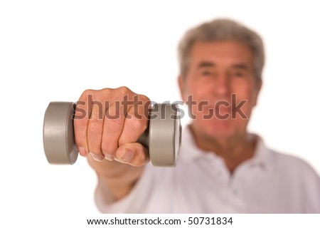 stock photo Senior older man lifting weights during gym workout session